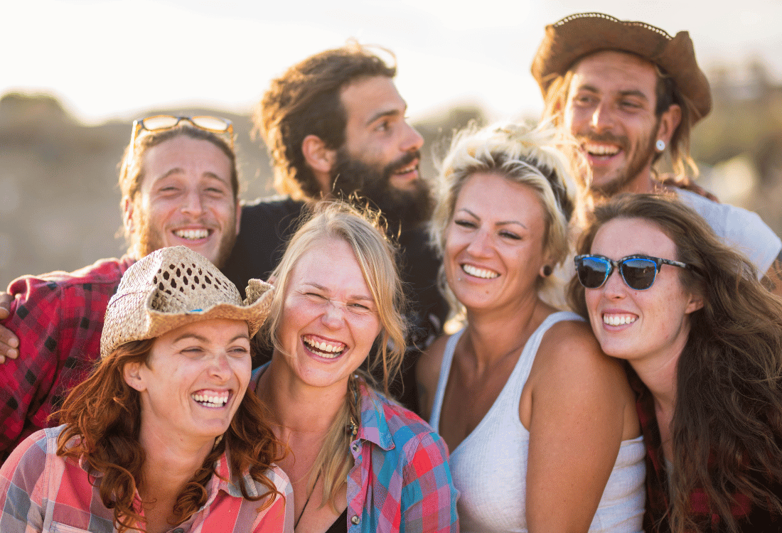 A group of adults having fun on a summers day.